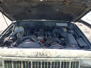 1996 Jeep Cherokee Sport with VIN 1J4FJ68S2TL154142, listed as a IAAI auction lot 42116515 with 197,095 mi miles and . Bid and sale history available at DreamBid. Image 10.