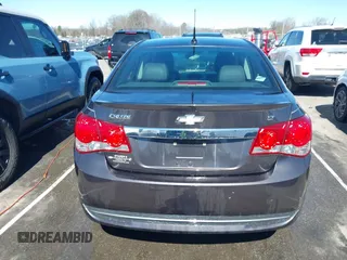 2014 Chevrolet Cruze 2LT z VIN 1G1PE5SB7E7200554, wystawiony jako IAAI lot #41739058 z przebiegiem 103 259 mil mil oraz . Historia ofert i sprzedaży dostępna na DreamBid. Obrazek 16.
