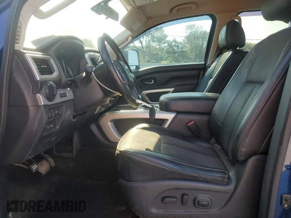 2017 Nissan Titan Pro-4X with VIN 1N6AA1E5XHN544948, listed as a Copart auction lot 61851175 with 216,797 mi miles and Clean title. Bid and sale history available at DreamBid. Image 7.