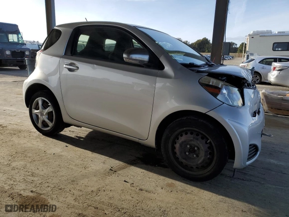 2015 Scion iQ with VIN JTNJJXB01FJ030680, listed as a Copart auction lot 46949235 with 27,509 mi miles and Salvage Title. Bid and sale history available at carsss.com. Image 4.