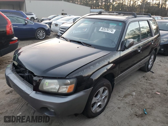 2003 Subaru Forester XS with VIN JF1SG65623H724854, listed as a Copart auction lot 82579774 with 176,986 mi miles and Salvage Title. Bid and sale history available at carsss.com. Image 1.