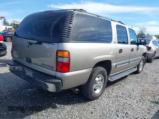 2002 Chevrolet Suburban LT with VIN 1GNFK16ZX2J138018, listed as a IAAI auction lot 41877385 with 235,161 mi miles. Bid and sale history available at carsss.com. Image 4.