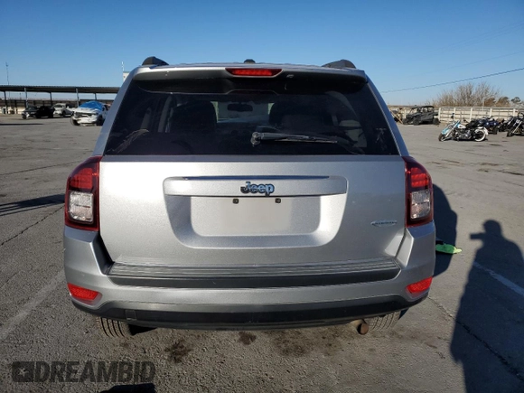 2016 Jeep Compass Latitude with VIN 1C4NJCEB7GD704858, listed as a Copart auction lot 42990065 with 79,380 mi miles and Salvage Title. Bid and sale history available at carsss.com. Image 6.