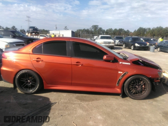 2010 Mitsubishi Lancer Evolution GSR with VIN JA32W8FV7AU003558, listed as a IAAI auction lot 40856259 with 123,639 mi miles and . Bid and sale history available at DreamBid. Image 14.