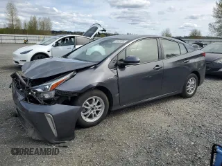 2020 Toyota Prius LE z VIN JTDL9RFU3L3013121, wystawiony jako Copart lot #52423385 z przebiegiem 75 229 mil mil oraz Szkoda całkowita • Salvage title. Historia ofert i sprzedaży dostępna na DreamBid. Obrazek 1.