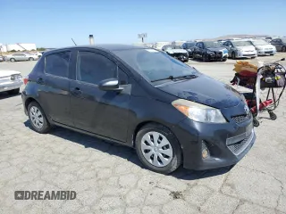 2012 Toyota Yaris L with VIN JTDKTUD34CD505077, listed as a Copart auction lot 63422445 with 141,067 mi miles and Salvage title. Bid and sale history available at DreamBid. Image 4.