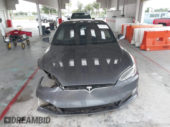 2021 Tesla Model S Long Range Plus with VIN 5YJSA1E28MF421655, listed as a IAAI auction lot 42407234 with 111,443 mi miles and . Bid and sale history available at DreamBid. Image 12.