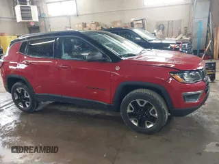 2018 Jeep Compass Trailhawk with VIN 3C4NJDDB5JT307366, listed as a IAAI auction lot 41839273 with 103,585 mi miles and . Bid and sale history available at carsss.com. Image 13.