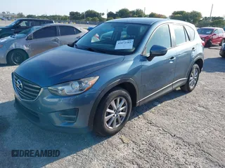 2016 Mazda CX-5 Sport with VIN JM3KE2BY8G0864983, listed as a IAAI auction lot 42072385 with 141,104 mi miles. Bid and sale history available at carsss.com. Image 17.