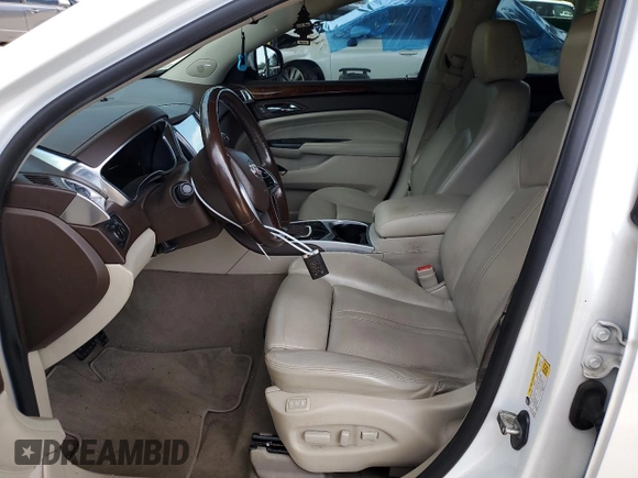 2013 Cadillac SRX Premium Collection with VIN 3GYFNEE30DS529808, listed as a Copart auction lot 61931185 with 131,245 mi miles and Salvage title. Bid and sale history available at DreamBid. Image 7.