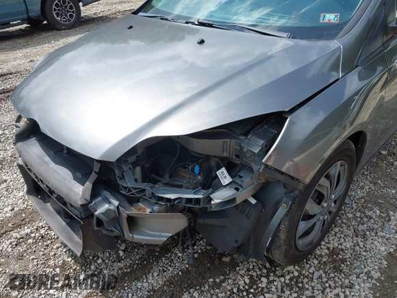 2012 Ford Focus SE with VIN 1FAHP3F29CL310052, listed as a IAAI auction lot 42671578 with 220,537 mi miles and . Bid and sale history available at DreamBid. Image 6.