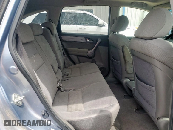 2009 Honda CR-V EX z VIN JHLRE38559C011942, wystawiony jako Copart lot #56342865 z przebiegiem 207 505 mil mil oraz Szkoda całkowita • Salvage title. Historia ofert i sprzedaży dostępna na DreamBid. Obrazek 11.