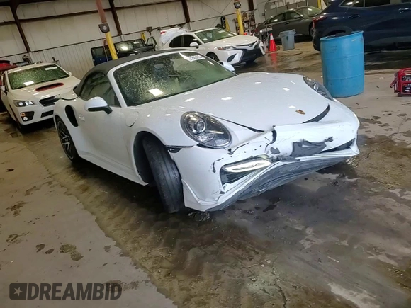 2015 Porsche 911 Turbo z VIN WP0CD2A91FS178328, wystawiony jako Copart lot #57880135 z przebiegiem 34 588 mil mil oraz Szkoda całkowita • Salvage title. Historia ofert i sprzedaży dostępna na DreamBid. Obrazek 13.