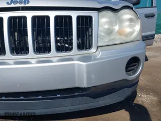 2005 Jeep Grand Cherokee Laredo with VIN 1J8GR48K25C667992, listed as a IAAI auction lot 42094246 with 281,242 mi miles. Bid and sale history available at carsss.com. Image 6.