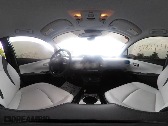2021 Toyota Prius L Eco with VIN JTDKAMFU6M3137679, listed as a IAAI auction lot 42488129 with 52,414 mi miles and . Bid and sale history available at DreamBid. Image 22.