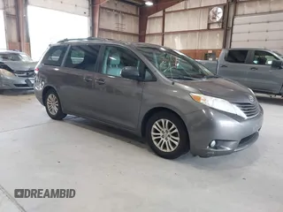 2011 Toyota Sienna XLE AAS with VIN 5TDYK3DC9BS086170, listed as a IAAI auction lot 42596944 with 156,813 mi miles and . Bid and sale history available at DreamBid. Image 1.