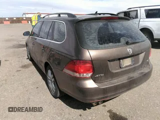 2011 Volkswagen Jetta SportWagen TDI with VIN 3VWPL7AJ4BM661050, listed as a IAAI auction lot 41859425 with 102,773 mi miles. Bid and sale history available at carsss.com. Image 3.