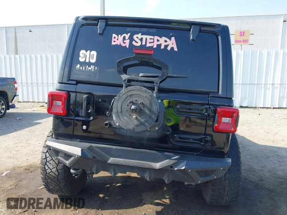 2020 Jeep Wrangler Unlimited Sahara with VIN 1C4HJXEG6LW211932, listed as a IAAI auction lot 42040546 with 74,732 mi miles and . Bid and sale history available at DreamBid. Image 17.