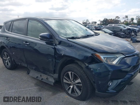 2017 Toyota RAV4 XLE with VIN JTMWFREV3HD105878, listed as a IAAI auction lot 41889338 with 75,784 mi miles. Bid and sale history available at carsss.com. Image 6.