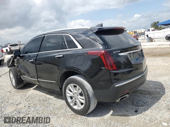2021 Cadillac XT5 FWD Luxury with VIN 1GYKNAR46MZ127028, listed as a Copart auction lot 47555235 with 48,364 mi miles and Salvage Title. Bid and sale history available at carsss.com. Image 2.