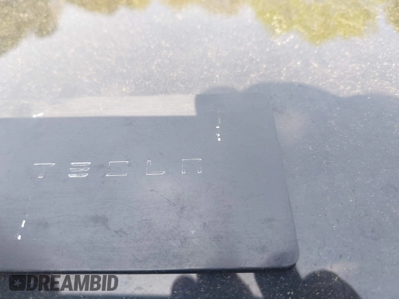 2020 Tesla Model Y Long Range with VIN 5YJYGDEE2LF029385, listed as a IAAI auction lot 42164786 with 58,685 mi miles and . Bid and sale history available at DreamBid. Image 11.