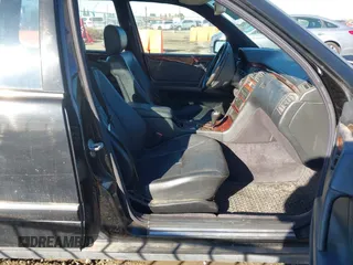 1999 Mercedes-Benz E-Class with VIN WDBJH82F2XX027360, listed as a IAAI auction lot 40977518 with 1 mi miles. Bid and sale history available at carsss.com. Image 5.