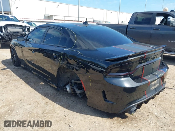 2019 Dodge Charger R/T with VIN 2C3CDXCT2KH575297, listed as a IAAI auction lot 41661339 with 119,854 mi miles and . Bid and sale history available at DreamBid. Image 3.