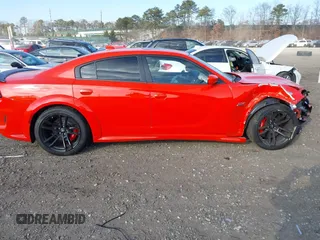 2022 Dodge Charger Scat Pack Widebody with VIN 2C3CDXGJ3NH101081, listed as a IAAI auction lot 41351466 with 9,575 mi miles and . Bid and sale history available at DreamBid. Image 13.
