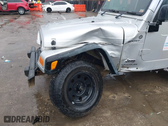 2006 Jeep Wrangler Sport Right Hand Drive with VIN 1J4F449SX6P764491, listed as a IAAI auction lot 41709726 with 290,798 mi miles. Bid and sale history available at carsss.com. Image 6.