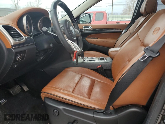 2013 Jeep Grand Cherokee Overland with VIN 1C4RJFCG7DC571280, listed as a Copart auction lot 47250365 with 53,907 mi miles and Salvage Title. Bid and sale history available at carsss.com. Image 7.