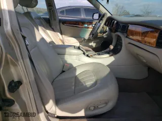 1998 Jaguar XJ with VIN SAJHX1242WC845736, listed as a Copart auction lot 82006044 with 188,785 mi miles and Salvage Title. Bid and sale history available at carsss.com. Image 7.
