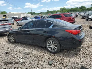 2015 Infiniti Q50 Premium z VIN JN1BV7ARXFM409465, wystawiony jako Copart lot #57295785 z przebiegiem 144 328 mil mil oraz Szkoda całkowita • Salvage title. Historia ofert i sprzedaży dostępna na DreamBid. Obrazek 2.