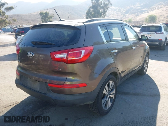 2013 Kia Sportage EX with VIN KNDPC3A23D7465943, listed as a IAAI auction lot 42828113 with 222,309 mi miles and . Bid and sale history available at DreamBid. Image 4.