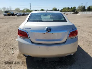 2013 Buick LaCrosse Premium 2 z VIN 1G4GH5E33DF158435, wystawiony jako Copart lot #56209755 z przebiegiem 77 565 mil mil oraz Szkoda całkowita • Salvage title. Historia ofert i sprzedaży dostępna na DreamBid. Obrazek 6.
