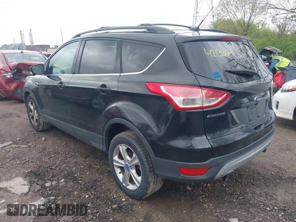 2013 Ford Escape SE with VIN 1FMCU0GX6DUC98598, listed as a IAAI auction lot 42133641 with 174,111 mi miles and . Bid and sale history available at DreamBid. Image 3.