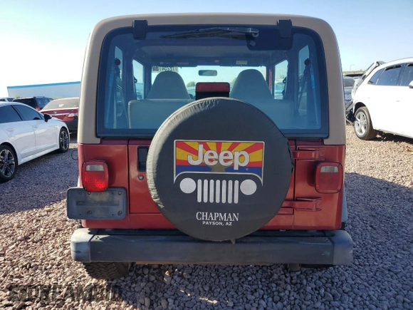 1998 Jeep Wrangler SE with VIN 1J4FY29P7WP792463, listed as a Copart auction lot 72254154 with 179,114 mi miles and Salvage Title. Bid and sale history available at carsss.com. Image 6.