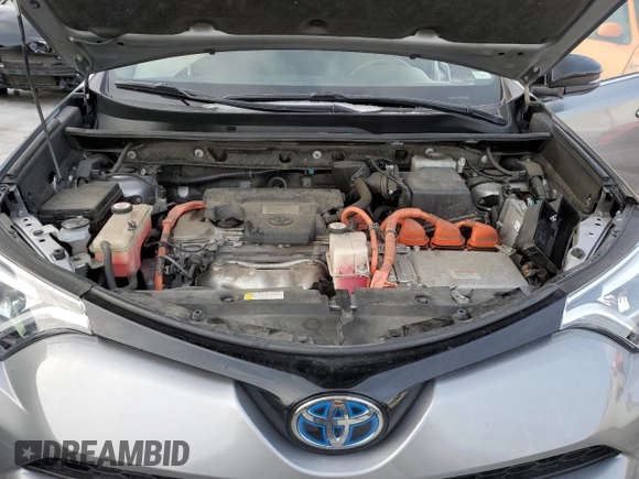 2018 Toyota RAV4 Hybrid SE z VIN JTMJJREV0JD246230, wystawiony jako Copart lot #89095135 z przebiegiem Nie podano mil oraz Szkoda całkowita • Salvage title. Historia ofert i sprzedaży dostępna na DreamBid. Obrazek 13.