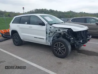 2017 Jeep Grand Cherokee Trailhawk with VIN 1C4RJFLG5HC803400, listed as a IAAI auction lot 42052250 with 108,374 mi miles and . Bid and sale history available at DreamBid. Image 1.