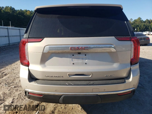2021 GMC Yukon SLT with VIN 1GKS1BKDXMR435793, listed as a Copart auction lot 76443834 with 71,027 mi miles and Salvage Title. Bid and sale history available at carsss.com. Image 6.