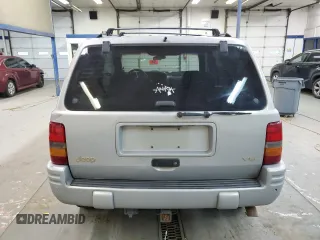 1998 Jeep Grand Cherokee Limited with VIN 1J4GZ78Y3WC216952, listed as a Copart auction lot 83239574 with 186,809 mi miles and Salvage Title. Bid and sale history available at carsss.com. Image 6.