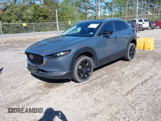 2023 Mazda CX-30 2.5 S Carbon Edition with VIN 3MVDMBCM5PM528946, listed as a IAAI auction lot 41882936 with 62,815 mi miles. Bid and sale history available at carsss.com. Image 17.