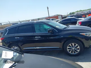 2015 Infiniti QX60 with VIN 5N1AL0MNXFC544896, listed as a IAAI auction lot 42009914 with 102,815 mi miles and . Bid and sale history available at DreamBid. Image 13.