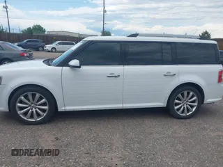 2016 Ford Flex Limited z VIN 2FMHK6DT8GBA18903, wystawiony jako IAAI lot #42460131 z przebiegiem 114 165 mil mil oraz . Historia ofert i sprzedaży dostępna na DreamBid. Obrazek 14.