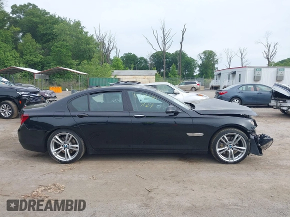 2015 BMW 7 Series 740i с VIN WBAYA6C54FGK16411, выставлен на аукционе IAAI как лот 42332689 с пробегом 59 153 миль миль и . История ставок и продаж доступна на DreamBid. Изображение 13.
