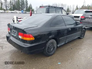 1998 Honda Civic DX with VIN 1HGEJ6121WL063073, listed as a IAAI auction lot 41711152 with 163,267 mi miles. Bid and sale history available at carsss.com. Image 4.