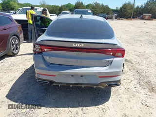 2022 Kia K5 GT-Line z VIN 5XXG64J23NG156401, wystawiony jako IAAI lot #42051123 z przebiegiem 71 853 mil mil oraz . Historia ofert i sprzedaży dostępna na DreamBid. Obrazek 16.