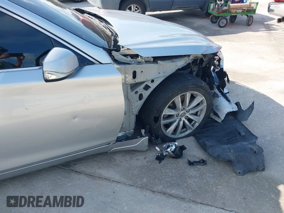 2014 Infiniti Q50 with VIN JN1BV7AP4EM677506, listed as a IAAI auction lot 40113207 with 142,446 mi miles and . Bid and sale history available at DreamBid. Image 15.