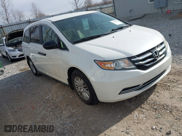 2014 Honda Odyssey LX with VIN 5FNRL5H24EB001551, listed as a IAAI auction lot 41879040 with 119,200 mi miles and . Bid and sale history available at DreamBid. Image 1.