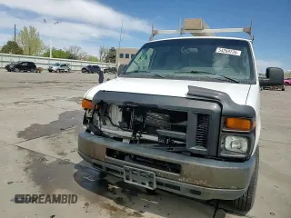 2012 Ford Econoline Cargo Super Duty Commercial z VIN 1FTSE3EL6CDA32009, wystawiony jako Copart lot #54269735 z przebiegiem 323 928 mil mil oraz Szkoda całkowita • Salvage title. Historia ofert i sprzedaży dostępna na DreamBid. Obrazek 14.