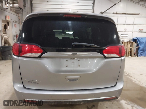 2017 Chrysler Pacifica Touring L with VIN 2C4RC1BG7HR831320, listed as a IAAI auction lot 41805697 with 137,743 mi miles and . Bid and sale history available at DreamBid. Image 16.